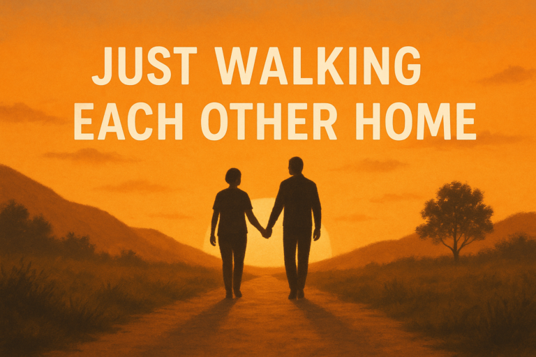 2 people walking down a path together to the setting sun.